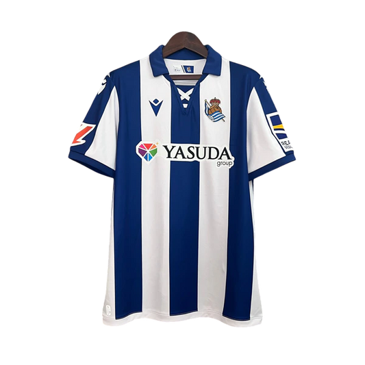 Camisa Real Sociedad Home 24/25 - Macron Torcedor Masculina Lançamento